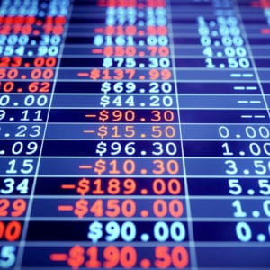 Accountant career digital accounting ledgers on a blue screen with negative numbers in red and positive numbers in white