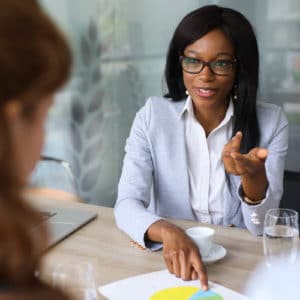 Marketing Manager having a meeting with her team