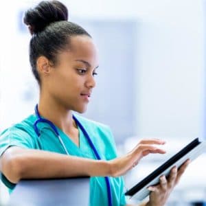 Nurse checking medical records