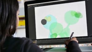 Animator creates animation on computer screen