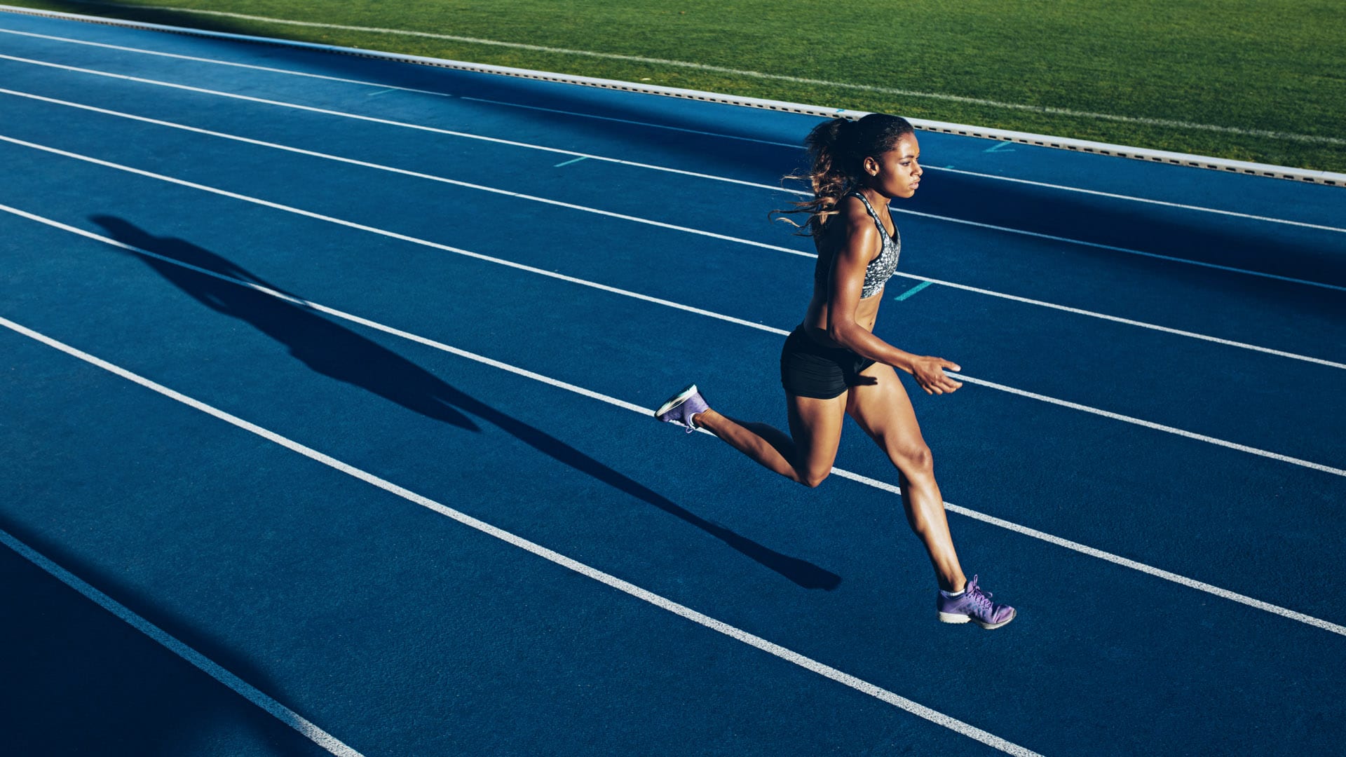 sport shoes worn by athletes who race on tracks