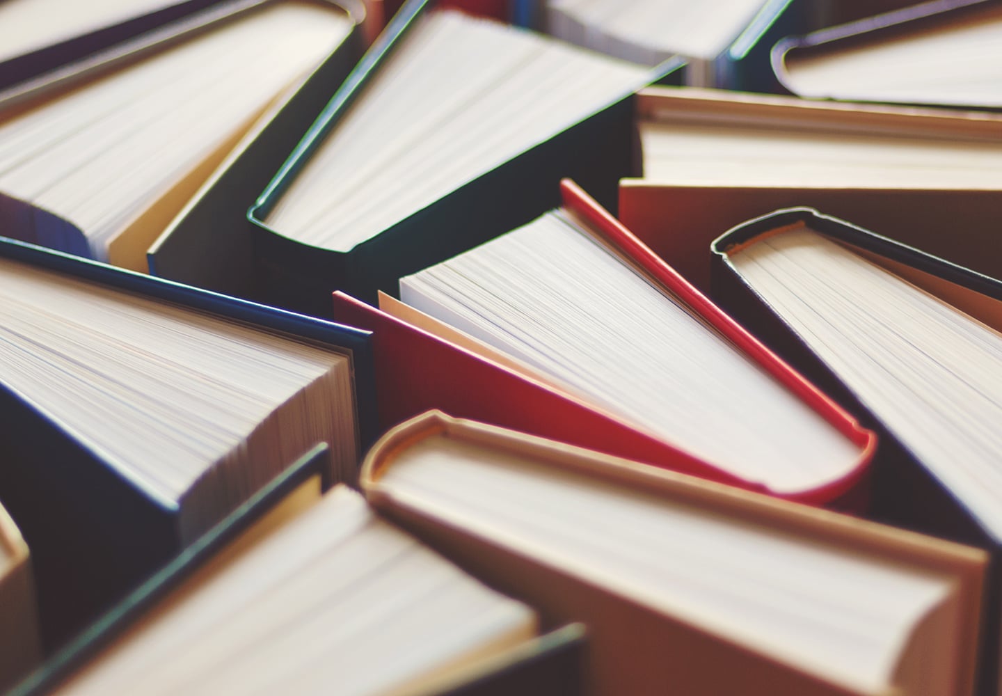 Literature books of different colors arranged in a pattern