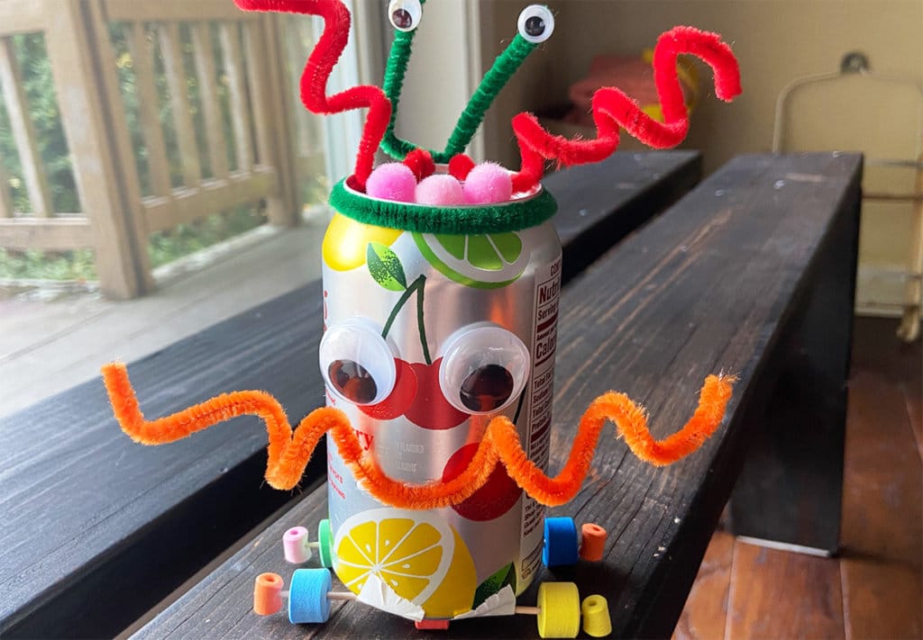 mini robot craft project for groups made of aluminum cans toothpicks and brightly colored foam