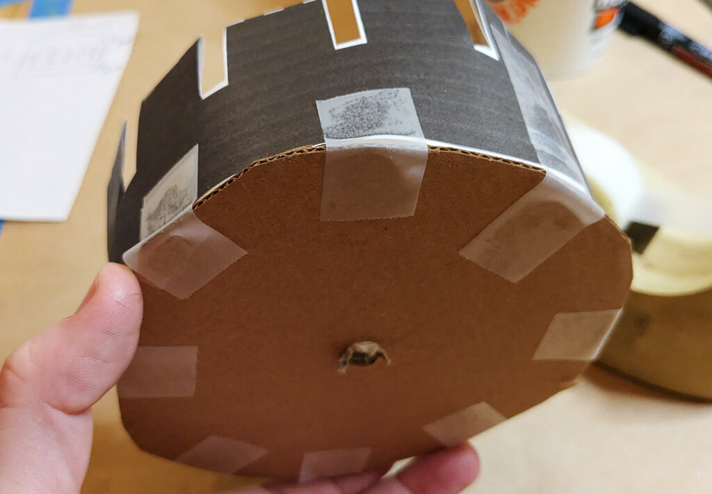 Zoetrope activity -tape to cardboard circle