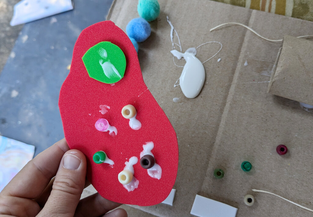 Glue down your arrangement - Scrap Sculpture