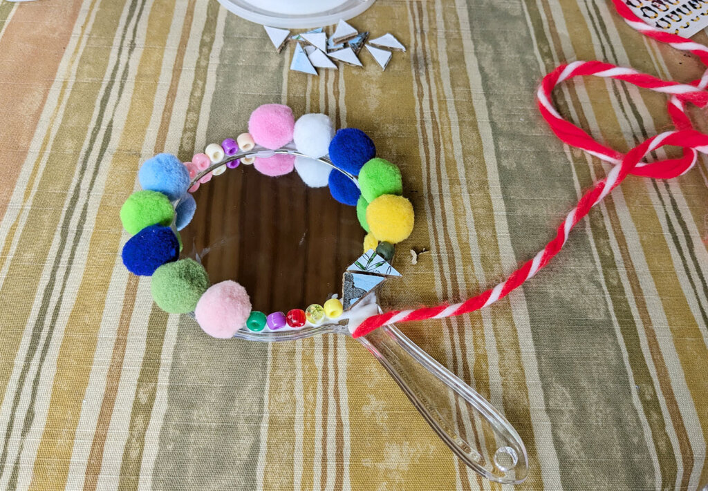 Glue one end of your yarn to your mirror - Mirror Decoration Activity for Public Speaking video