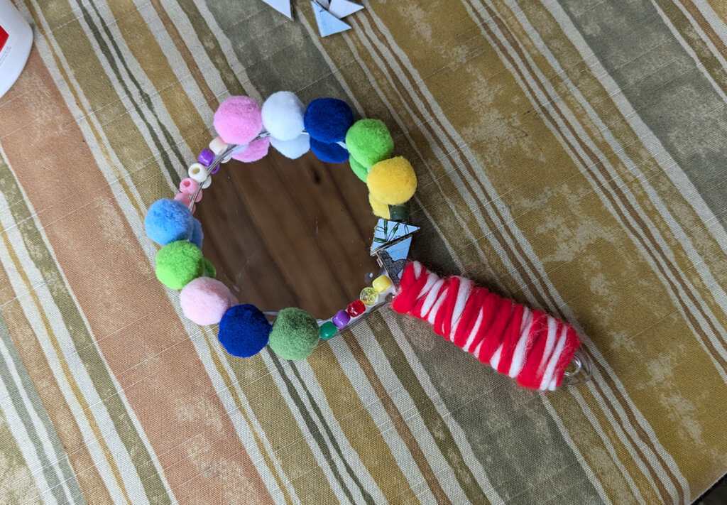 Wrap the handle of your mirror and let dry - Mirror Decoration Activity for Public Speaking video