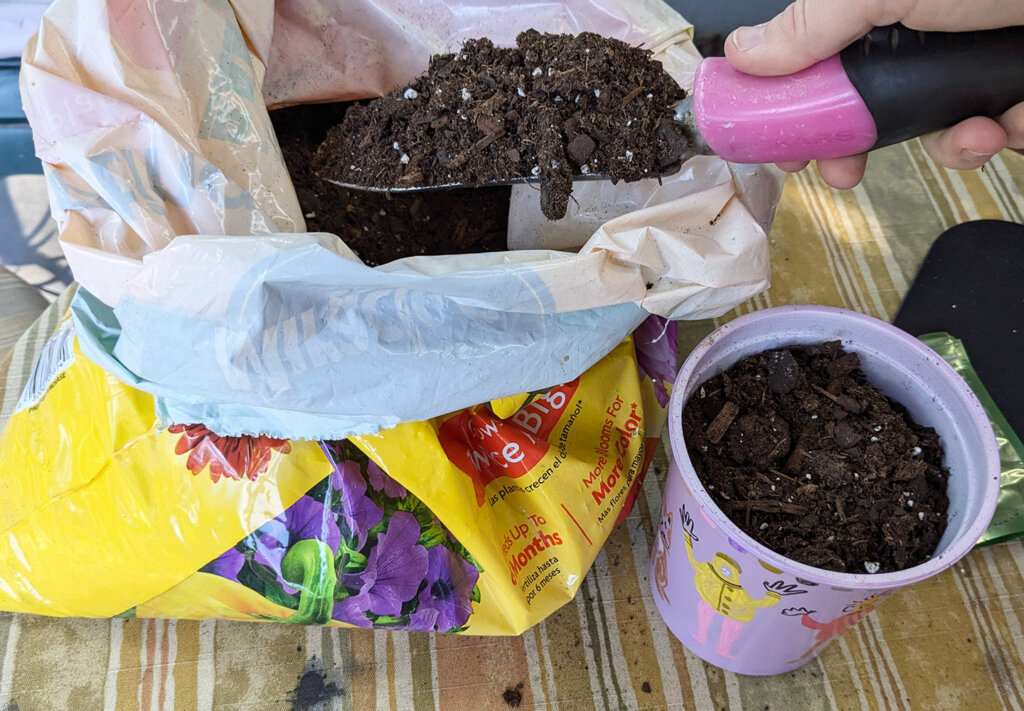 Fill your pot with soil - Personalized Planters Activity - Using Creativity to Find Your Path video